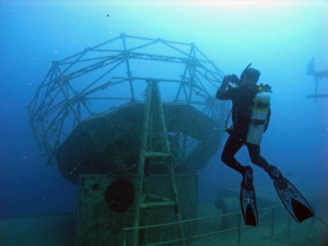 A diver snaps a pic at one of the Vandenberg's iconic radar dishes.